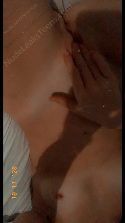 Chelsea Caroll – Glasses babe lies back masturbating her shaved pussy