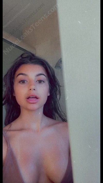 Gabriella Whited – Sexy brunette dances close to camera singing